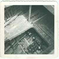 Image: B+W photo of 3 longshoremen at work in the cargo hold of an unidentified vessel, Hoboken, no date, ca. 1960.