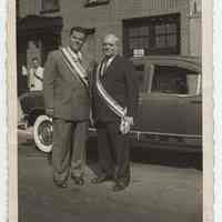 B+W photo of Dominic Pescatore (right) with unidentified man standing on street, Hoboken, no date, ca. 1950.