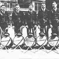 Digital image of photocopy of b+w photo of 5 members of Our Lady of Grace Cadets (Lancers) in yard, Hoboken, 1941-42.