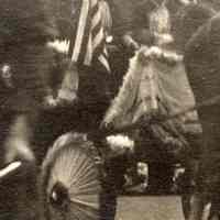          detail center of costume carriage drivers; decorated wheel
   