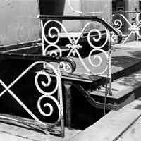 B+W photo detail of old iron railings in front of a store, 908 Washington St., Hoboken, N.J., no date (ca. 1968-1972).