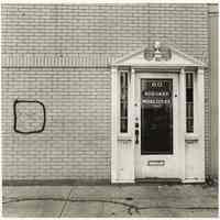 B+W photo of the exterior entrance to the Hoboken Model Cities Agency offices, 80 Washington St., Hoboken, no date, [1976].