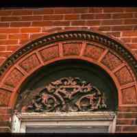          Color slide of close up-view of semicircular arch voussoirs on one of the buildings between 206 and 218 13th on the N side between Park and Garden picture number 1
   