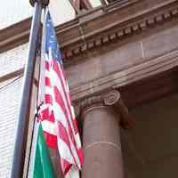          12: ionic capital at left of portico; flagpole; east facade
   