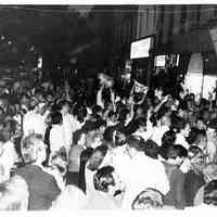 B+W photo of Tom Vezzetti supporters outside his campaign headquarters, 536 Washington St., on election night, Hoboken, [June 11, 1985].