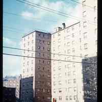 Color slide of Harrison Gardens building.