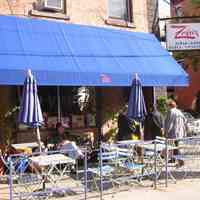 Digital copy of color photo of food tour members outside Zafra Kitchen, 301 Willow Ave., Hoboken, Oct. 18, 2003.