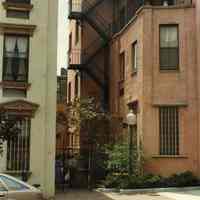 Color photo of entrance to courtyard at 38 First St., Hoboken, May 1985.