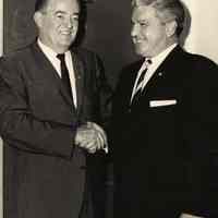 B+W photo of John J. Grogan (right) shaking hands with Hubert H. Humphrey, n.p., n.d., ca. 1960-1968.