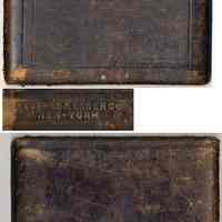          top and bottom of case with detail of K&E top mark, lower left corner
   