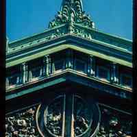 Color slide of detail view of the Lackawanna Terminal façade roofline showing finial, pediment and cornice