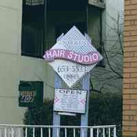 Color photo of painted sign for Underground Hair Studio, 407 Adams St., Hoboken, Jan. 3 & 4, 2002.