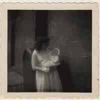          photo 2: Polly (Mrs. Anton) Peskens  holding a baby
   