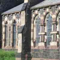          25: view southwest of east facade with windows and buttresses
   