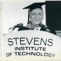 B+W wirephoto of Frank Sinatra at Stevens Institute of Technology commencement giving speech at podium after receiving honorary degree, Hoboken, May 23, 1985.