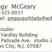 Business cards of Peggy McGeary, quilt artist.