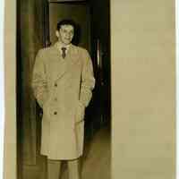 Sinatra photo: Frank Sinatra posing outside office of Local Draft Board No. 3, 160 Danforth St., Jersey City , N.J. Dec. 9, 1943.