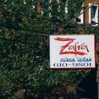 Color photo of hanging double-sided sign for Zafra Restaurant, 301 Willow Avenue, Hoboken, Sept., 1-5, 2001.