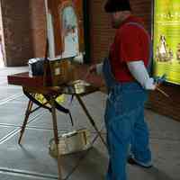 Color photos, 11, of Chris Kappmeier painting in Hoboken Historical Museum walkway, Hoboken, April 21, 2006.