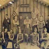 Sepia-tone photo of members of the Active [Boat Club] posed outside their club house, (probably Hoboken), n.d., ca. 1890-1900.