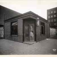 B+W photo of a derelict barber shop on unknown street corner, Hoboken, Nov. 5, 1933