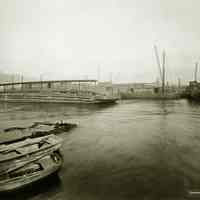 Sepia-tone photo of railroad marine division activity with lighterage on the waterfront in Weehawken, N.J., no date, ca. 1920.