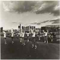 B+W photo of cheerleaders performing at a football game, JFK Stadium, Hoboken, no date, [1976].