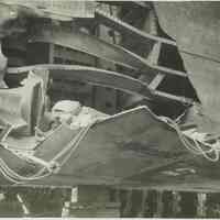 B+W photo of exterior view of hull plate and structural repairs underway on unidentified vessel at the Bethlehem Steel Shipyard, Hoboken Division, no