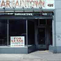 Color slide of an empty storefront at 420 Washington St., Hoboken, May, 1984.