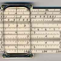 Slide rule, Ivorite, 4181-1C, with holder manufactured by Keuffel & Esser Company, Hoboken, ca. 1953.