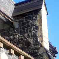          29: view of gable top of buttress, east facade
   