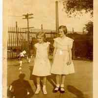 Sepia-toned photo of 2 young girls taken in Elysian Park, Hoboken, no date, ca. 1924-1926.