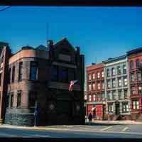          Color slide of eye-level view of the Hoboken Fire Department Engine Company No. 3 (Truck 2) fire station façades at 501 Observer Highway at the juncture with Newark and showing row houses at 510, 512 and 514 Observer Highway picture number 1
   