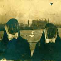 B+W photo of two nuns on board a vessel, no place, no date, ca. 1900-1920.