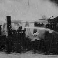          detail center: tugboat with fire line
   