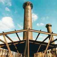          Digital image of color photo on the exterior roof with smokestacks of the former Hudson & Manhattan Rail Road powerhouse, Jersey City, March, 2000. picture number 1
   