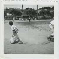 B+W photo of a Hoboken Police Athletic League baseball game at the high school sports field, Hoboken, no date, ca. 1955.