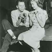 Black-and-white photo of Frank Sinatra and Jane Powell in a posed radio studio 