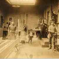 Digital copy of a sepia-tone photo of workshop interior of Kostelecky Brothers, Hoboken, no date, ca. 1900.