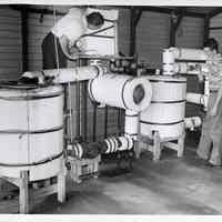 B+W photo of life test of high octane fuel pump for aircraft at United States Testing Co. facility, Hoboken, N.d., ca. 1970-1980.