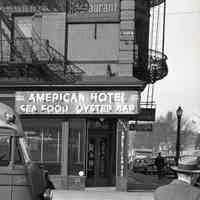          detail upper right: American Hotel, Oyster Bar signage; view north on River
   