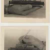          photo 2, top, model in hand; photo 3: hand from right with pencil
   