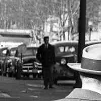          detail right: automobiles parked on River Street
   