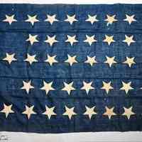 U.S. Navy Jack, 38 star, in use 1877-1890. From E.A. Stevens Post 104, Grand Army of the Republic, Hoboken; formerly property of Fergus McFadden.