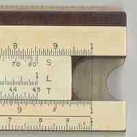          slide inverted, right end: scales on slide & window
   