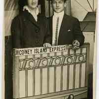 B+W photo postcard of man and woman posed at a Coney Island booth, N.Y., 1914.