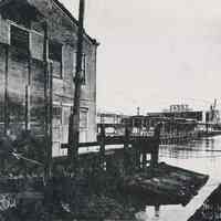 B+W photocopy of photo of the south side of 14th Street ferry slip from the bulkhead, Hoboken, Nov. 3, 1942.