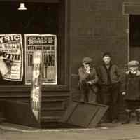         detail left: posters and boys
   