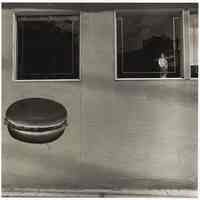 B+W photo of a painted hamburger sign below restaurant windows, Hoboken, no date, [1976].