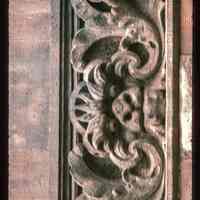 Color slide of close-up view of decorative tile on a building on Bloomfield between 10th and 11th